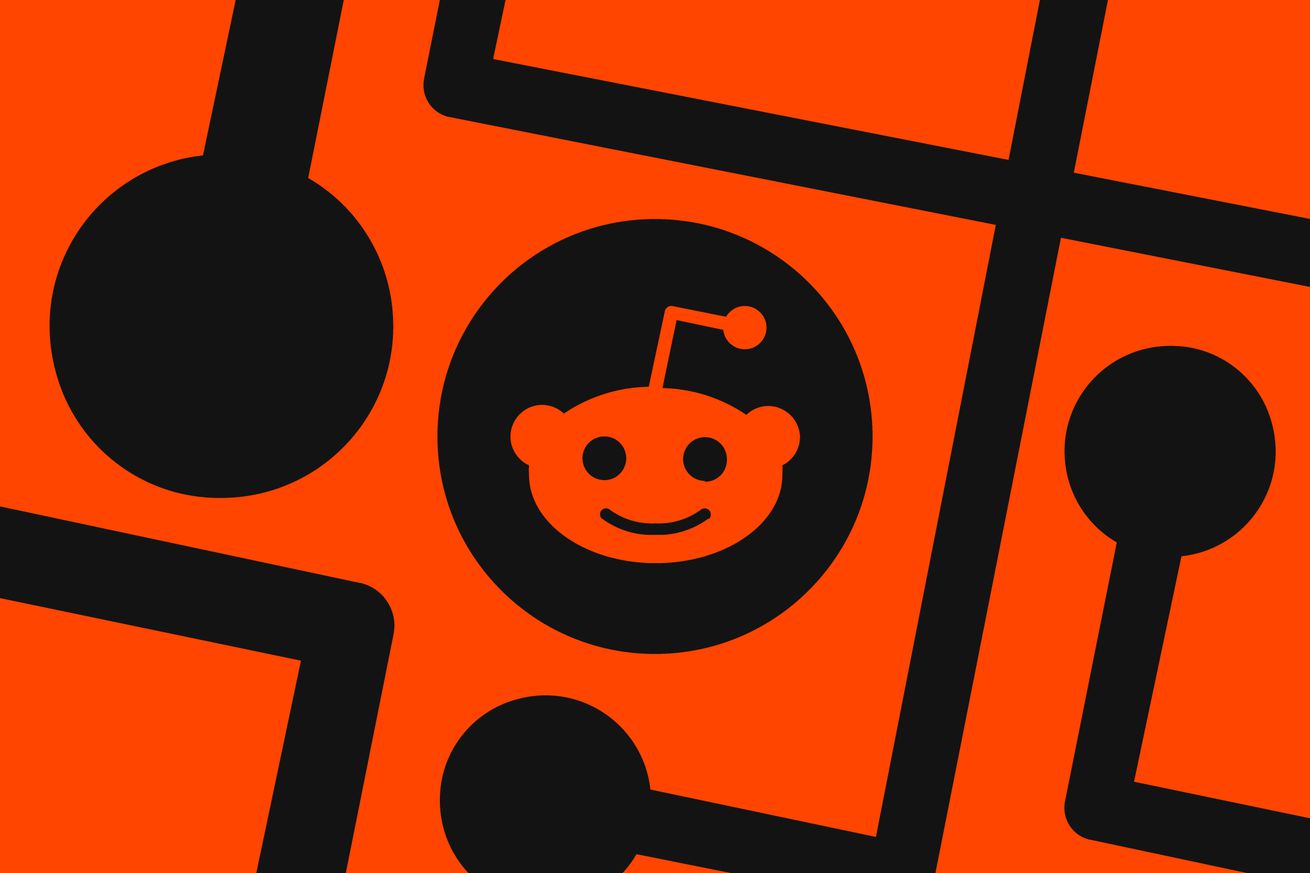 The Reddit logo on an orange and black background
