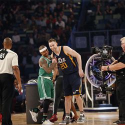 Isaiah Thomas of the Boston Celtics (4) shakes hands with Western Conference Gordon Hayward of the Utah Jazz (20) after competing in the skills competition during NBA All-Star Saturday Night events in New Orleans, Saturday, Feb. 18, 2017. (AP Photo/Gerald Herbert)