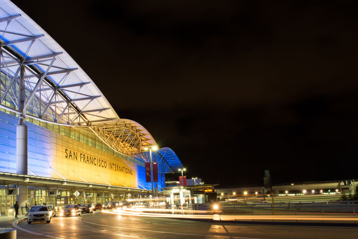 The exterior of SFO International Airport at night.