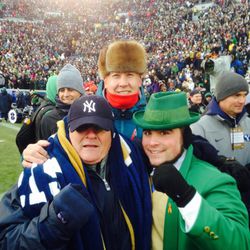 Rudy Ruettiger, left, James Clarke, middle, and the Notre Dame Fighting Irish mascot at the 2013 BYU-Notre Dame game in South Bend, Indiana.