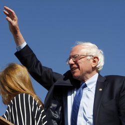 Democratic presidential candidate and Vermont Sen. Bernie Sanders waves to supporters before a speech at This is the Place Heritage Park in Salt Lake City, Friday, March 18, 2016.