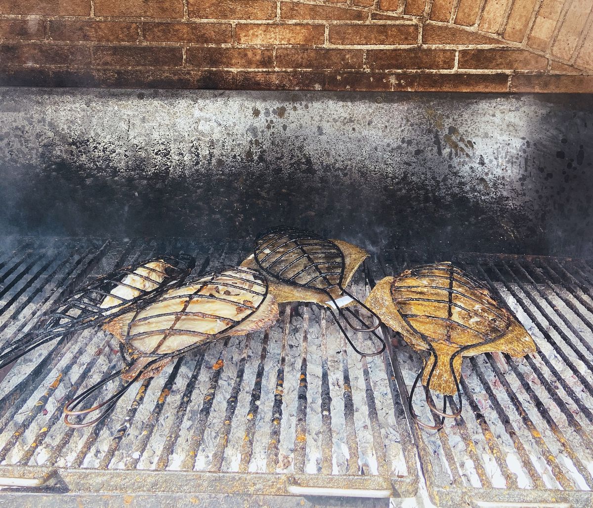 Large turbot on an outdoor grill