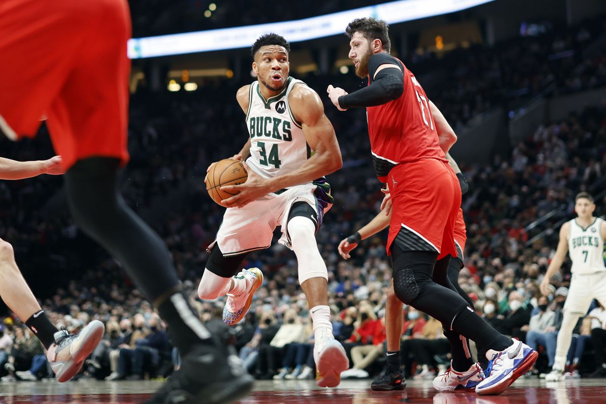 Milwaukee Bucks power forward Giannis Antetokounmpo (34) drives to the basket against Portland Trail Blazers Center Jusuf Nurkic (27) during the first half at Moda Center.