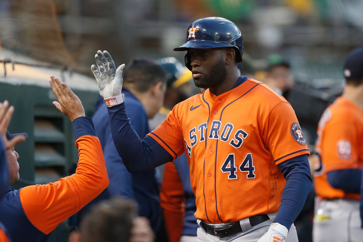 Yordan Alvarez #44 of the Houston Astros celebrates after scoring in the top of the fifth inning against the Oakland Athletics at RingCentral Coliseum