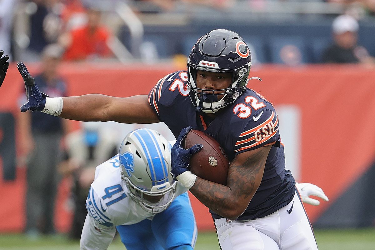 David Montgomery #32 of the Chicago Bears runs against the Detroit Lions at Soldier Field on October 03, 2021 in Chicago, Illinois.