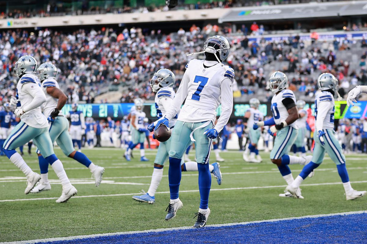 Trevon Diggs #7 of the Dallas Cowboys reacts after intercepting a pass in the endzone that was intended for Kenny Golladay #19 of the New York Giants during the fourth quarter at MetLife Stadium on December 19, 2021 in East Rutherford, New Jersey.