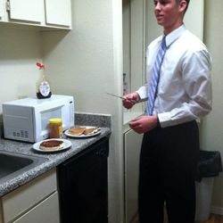 Elder Conner Toolson spreads peanut butter on his pancakes. Elder Toolson, a former Lone Peak High basketball player, is serving in the Texas Fort Worth Mission.