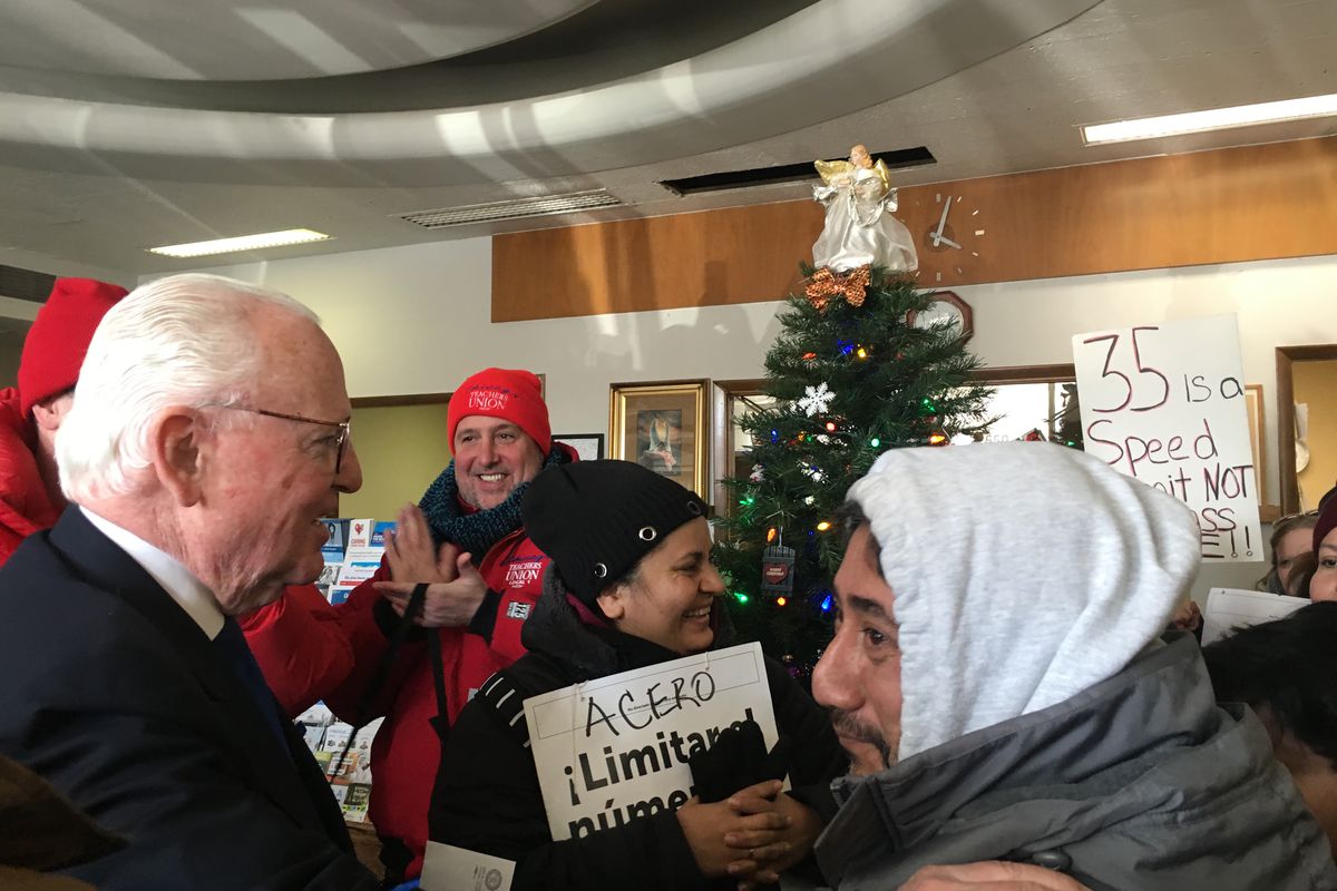 Chicago Alderman Ed Burke, left, met Dec. 7, 2018, with striking Acero teachers and their supporters, who were protesting at his office.