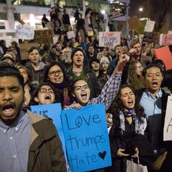 People protest against President-elect Donald Trump in downtown Salt Lake City on Sunday, Nov. 6, 2016.