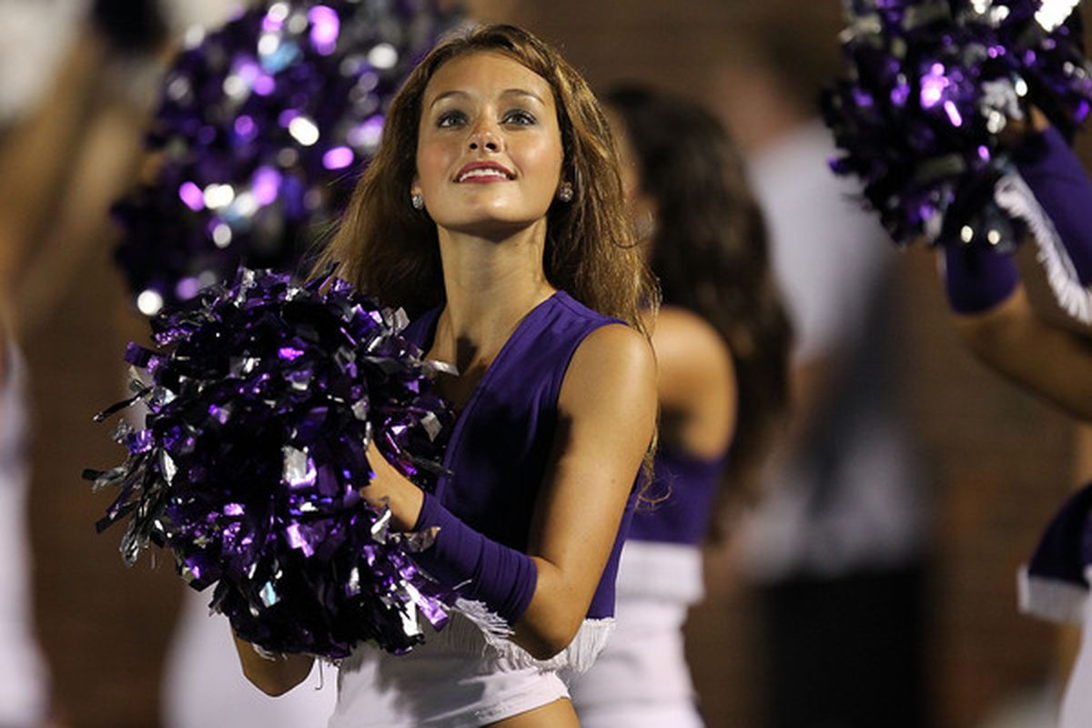 DALLAS - SEPTEMBER 24:   A TCU dance team member performs during a game at Gerald J. Ford Stadium on September 24 2010 in Dallas Texas.  (Photo by Ronald Martinez/Getty Images)