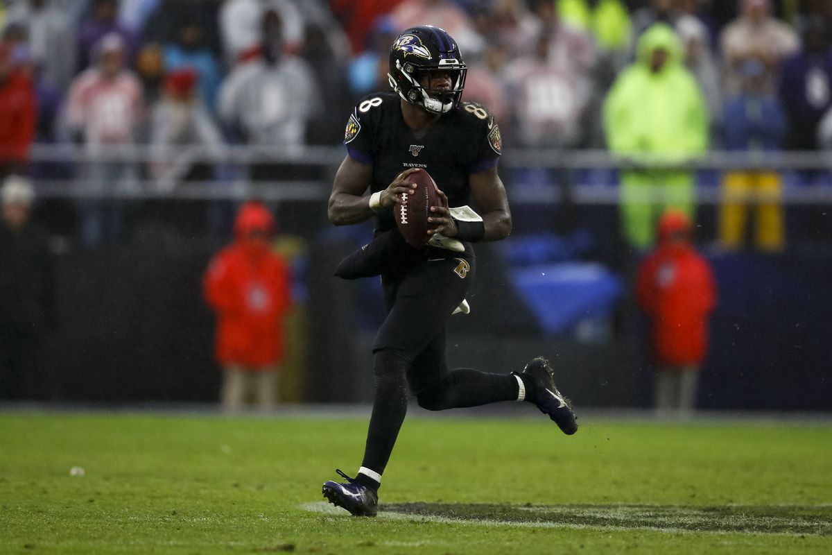 Lamar Jackson of the Baltimore Ravens scrambles against the San Francisco 49ers in the second half at M&amp;T Bank Stadium on December 1, 2019 in Baltimore, Maryland.