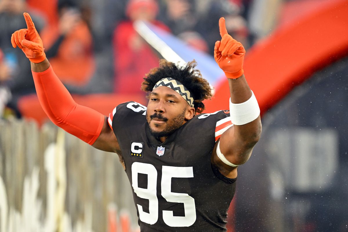 CLEVELAND, OHIO - DECEMBER 17: Defensive end Myles Garrett #95 of the Cleveland Browns celebrates during player introductions prior to the game against the Baltimore Ravens at FirstEnergy Stadium on December 17, 2022 in Cleveland, Ohio. The Browns defeated the Ravens 13-3.