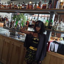 Batwoman slings drinks at Willie's Brew & Cue.