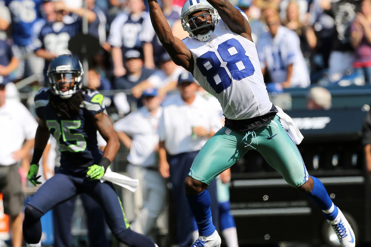 SEATTLE, WA - SEPTEMBER 16:  Wide receiver Dez Bryant #88 of the Dallas Cowboys just misses making a catch against the Seattle Seahawks at CenturyLink Field on September 16, 2012 in Seattle, Washington.  (Photo by Otto Greule Jr/Getty Images)