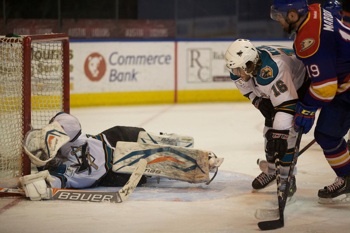 Worcester Sharks goaltender Harri Sateri lays back to make one of his 45 saves Saturday evening at the DCU Center in the Sharks' 4-3 overtime loss to the Norfolk Admirals.