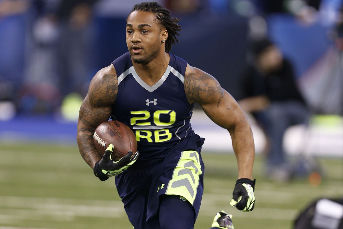 Feb 23, 2014; Indianapolis, IN, USA; Auburn Tigers running back Tre Mason runs drills during the 2014 NFL Combine at Lucas Oil Stadium. Mandatory Credit: Brian Spurlock-USA TODAY Sports