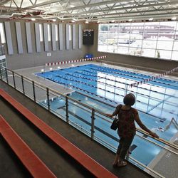 A visitor looks at the swimming pool at the new Granger High School on Saturday, June 1, 2013, in West Valley City.