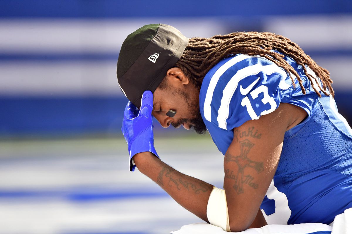 Indianapolis Colts wide receiver T.Y. Hilton (13) kneels in the end zone before the match against the Tennessee Titans at Lucas Oil Stadium.