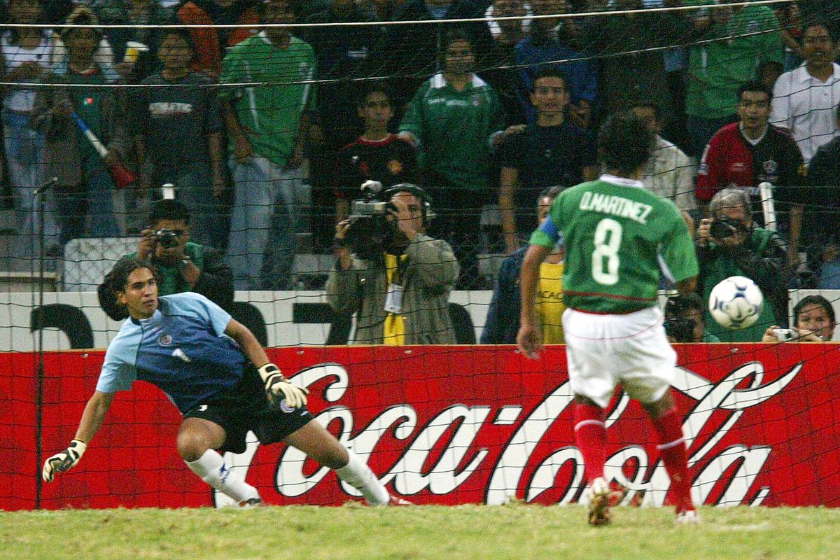 Mexican Diego Martinez (R) scores the go