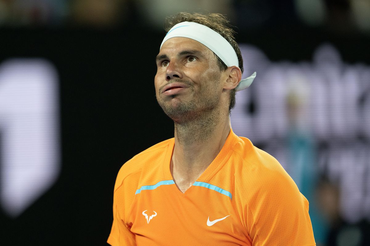 Rafael Nadal of Spain reacts in their round two singles match against Mackenzie McDonald of the United States during day three of the 2023 Australian Open at Melbourne Park on January 18, 2023 in Melbourne, Australia.