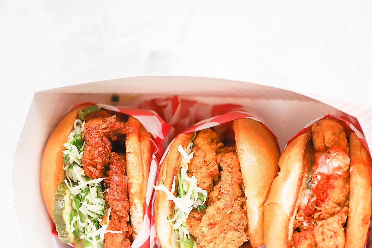 A lineup of fried chicken sandwiches from Roaming Rooster