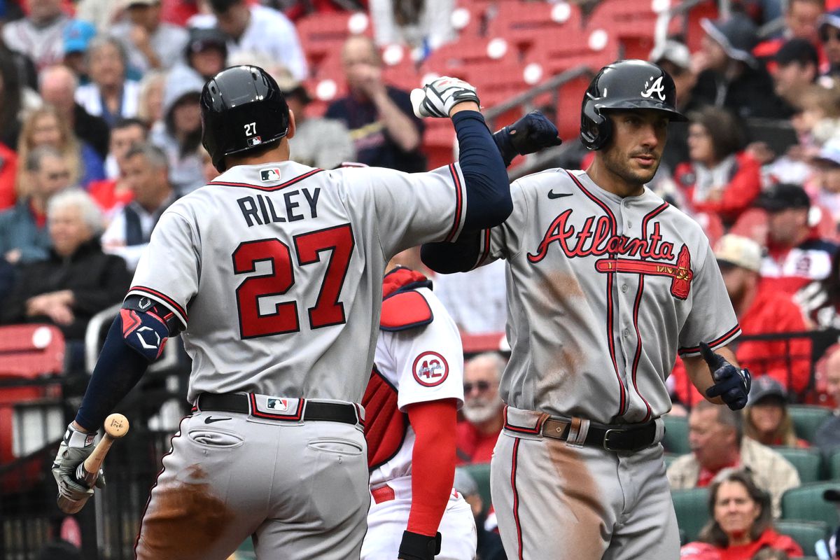Atlanta Braves third baseman Austin Riley congratulates Atlanta Braves first baseman Matt Olsen after his solo home run during an MLB game between the Atlanta Braves and the St. Louis Cardinals on April 05, 2023, at Busch Stadium, in St. Louis, MO.