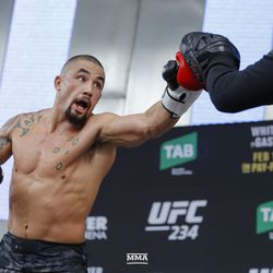 Robert Whittaker shows off his striking at UFC 234 workouts.