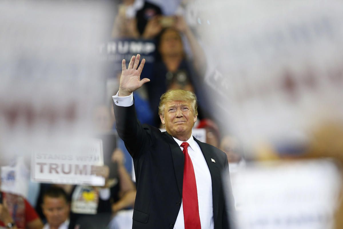 Republican presidential candidate Donald Trump waves to the crowd before he speaks during a campaign rally Saturday, March 5, 2016, in Orlando, Fla. 