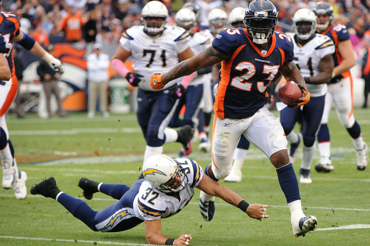 DENVER, CO - OCTOBER 9: Willis McGahee #23 of the Denver Broncos runs the ball against Eric Weddle #32 of the San Diego Chargers at Sports Authority Field at Mile High on October 9, 2011 in Denver, Colorado.  (Photo by Bart Young/Getty Images)