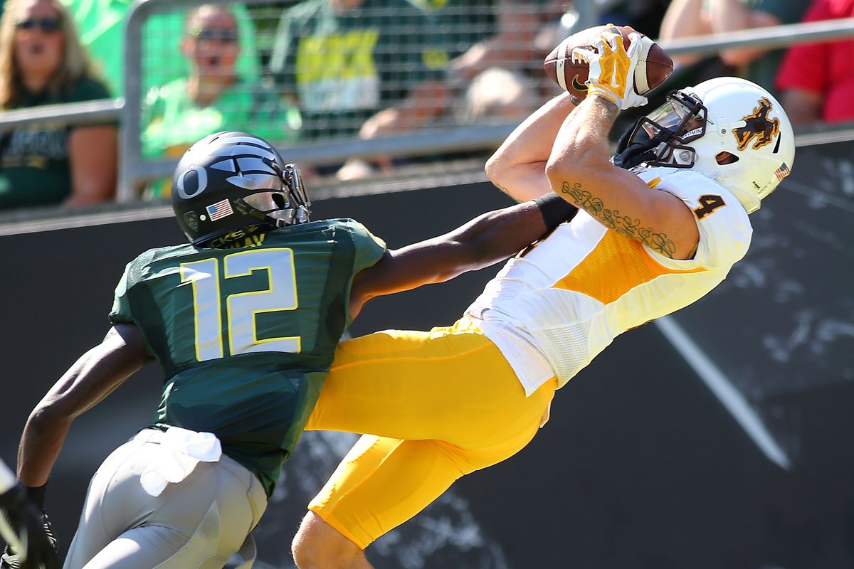 WYO receiver Tanner Gentry catches a touchdown pass against the Ducks