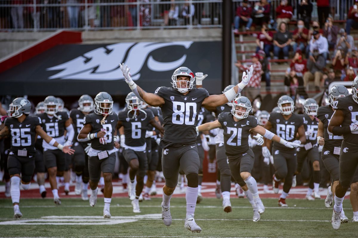 PULLMAN, WA - OCTOBER 16: Washington State EDGE Brennan Jackson (80) runs out of the tunnel prior to a PAC 12 conference matchup between the Stanford Cardinal and the Washington State Cougars on October 16, 2021, at Martin Stadium in Pullman, WA.
