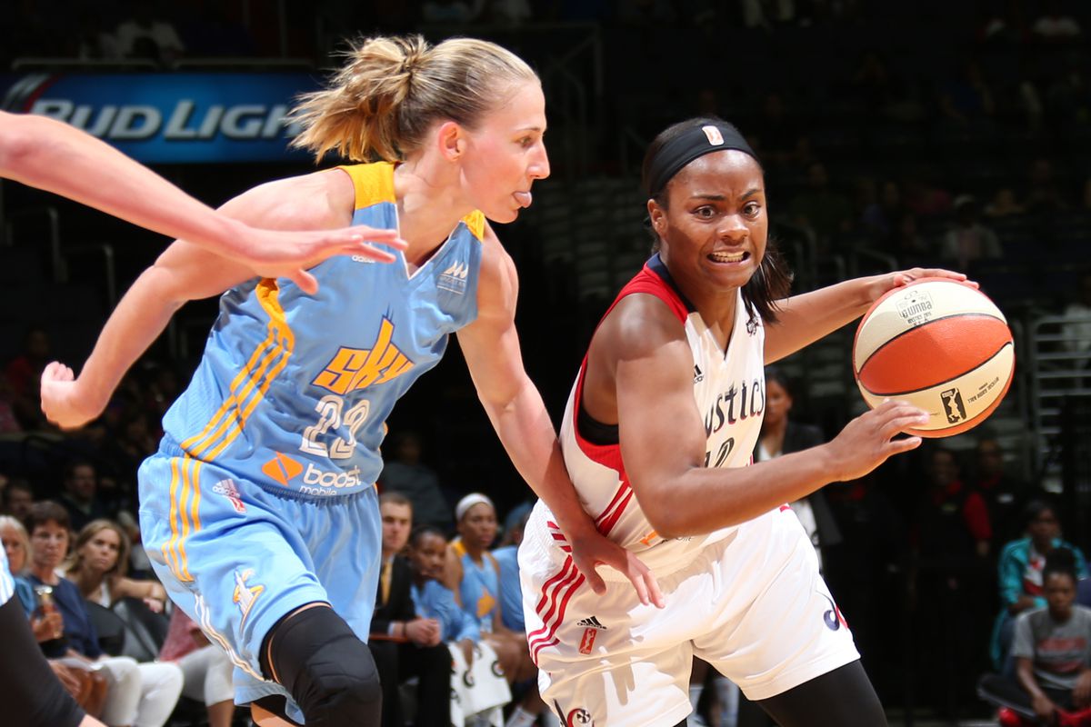 WASHINGTON, DC - JUNE 28: Ivory Latta #12 of the Washington Mystics handles the ball against the Chicago Sky in a WNBA game at the Verizon Center on June 28, 2015 in Washington, DC.