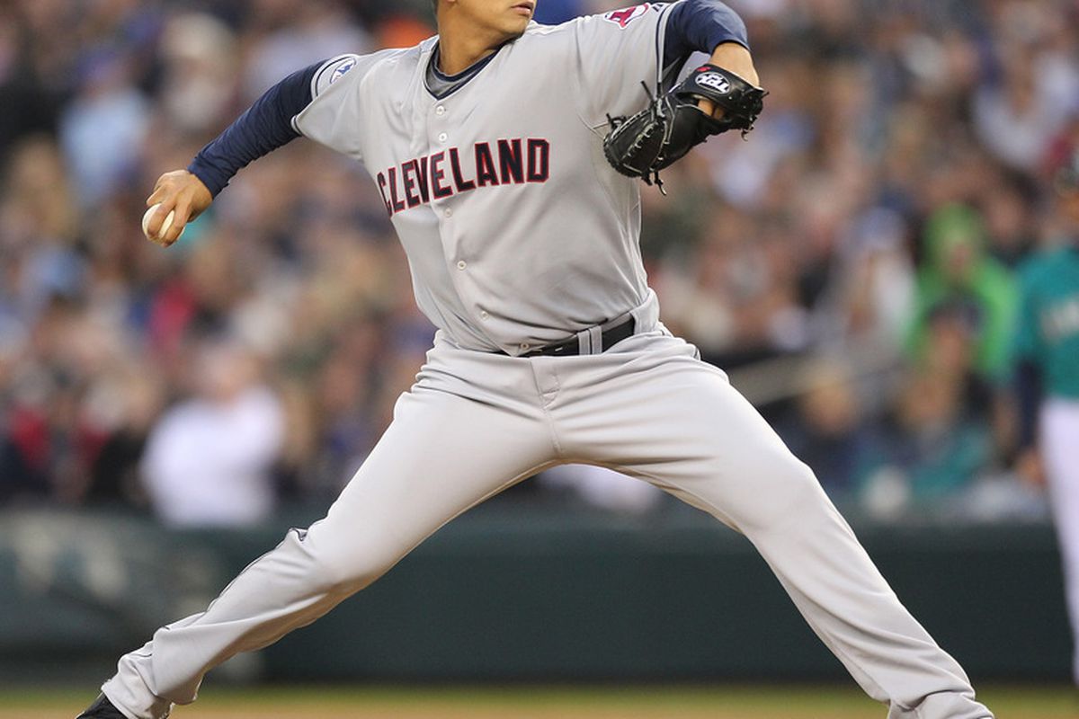 SEATTLE - APRIL 08:  Starting pitcher Carlos Carrasco #59 of the Cleveland Indians pitches against the Seattle Mariners during the Mariners' home opener at Safeco Field on April 8, 2011 in Seattle, Washington. (Photo by Otto Greule Jr/Getty Images)