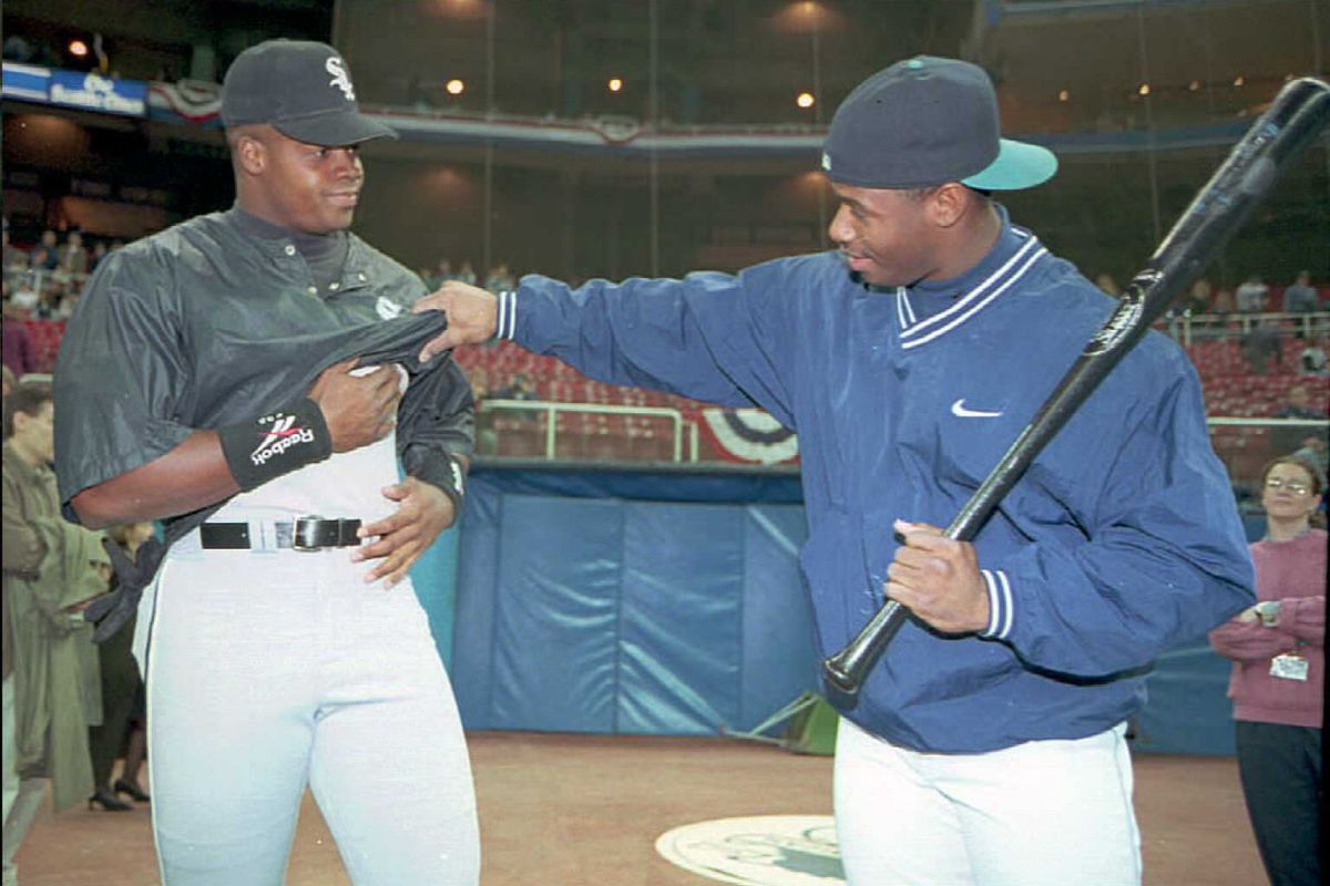 Ken Griffey Jr. clowns around with Frank Thomas before the 1996 Opening Day
