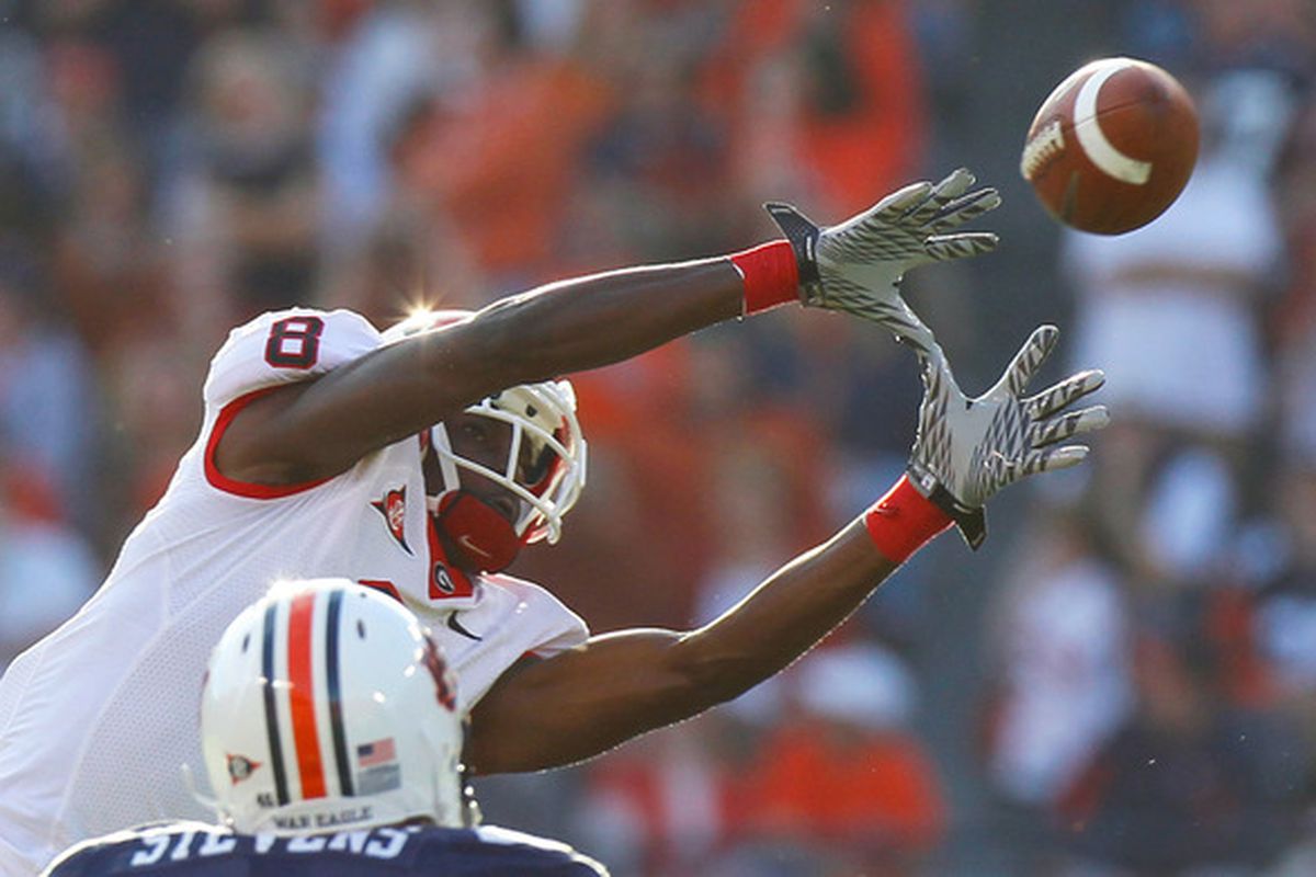 A.J. Green (8) of the Georgia Bulldogs pulls in this reception against Craig Stevens #46 of the Auburn Tigers at Jordan-Hare Stadium on November 13 2010 in Auburn Alabama.  (Photo by Kevin C. Cox/Getty Images)