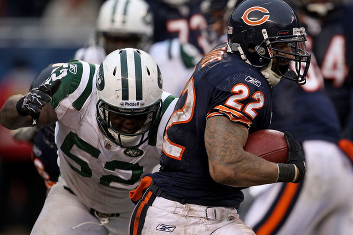 CHICAGO IL - DECEMBER 26: Matt Forte #22 of the Chicago Bears breaks away from David Harris #52 of the New York Jets at Soldier Field on December 26 2010 in Chicago Illinois. The Bears defeated the Jets 38-34. (Photo by Jonathan Daniel/Getty Images)