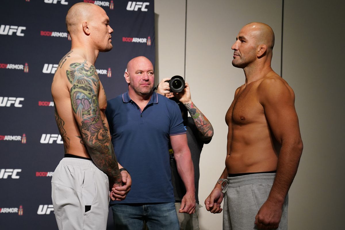 Opponents Anthony Smith and Glover Teixeira of Brazil face off during the official UFC Fight Night weigh-in on May 12, 2020 in Jacksonville, Florida.