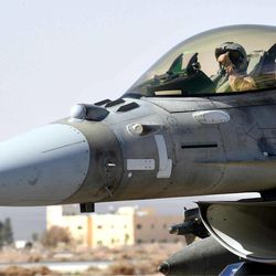 This photo released by WAM, the state news agency of the United Arab Emirates, shows an Emirati pilot in his F-16 at an air base in Jordan, Tuesday, Feb. 10, 2015. The United Arab Emirates launched airstrikes Tuesday targeting the Islamic State group, its official news agency said, marking its return to combat operations against the militants after it halted flights late last year. 