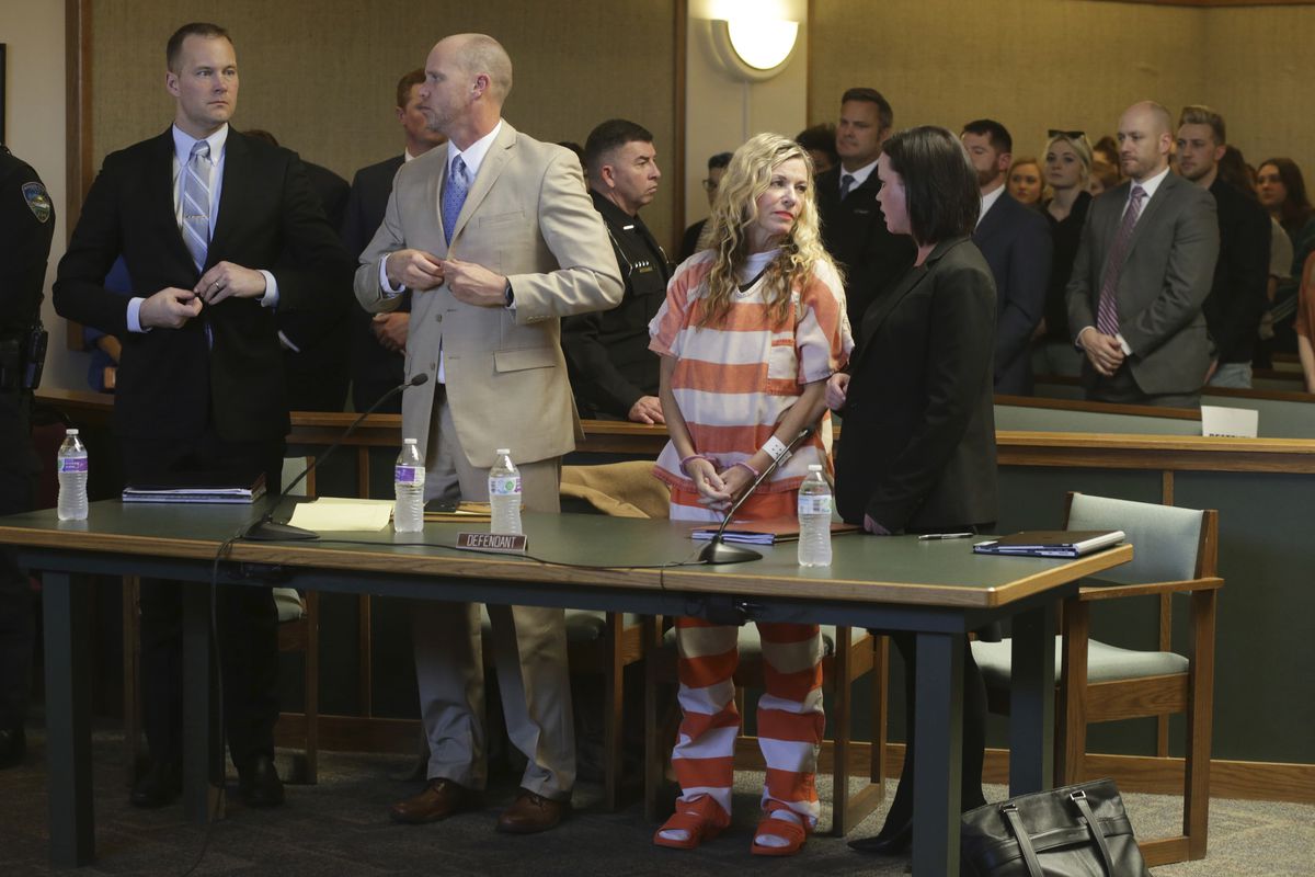 Lori Vallow Daybell, front, second right, and her defense team wait to leave the courtroom during her hearing on Friday, March 6, 2020, in Rexburg, Idaho. Daybell who is charged with felony child abandonment after her two children went missing nearly six months ago had her bond reduced to $1 million by an Idaho judge on Friday.