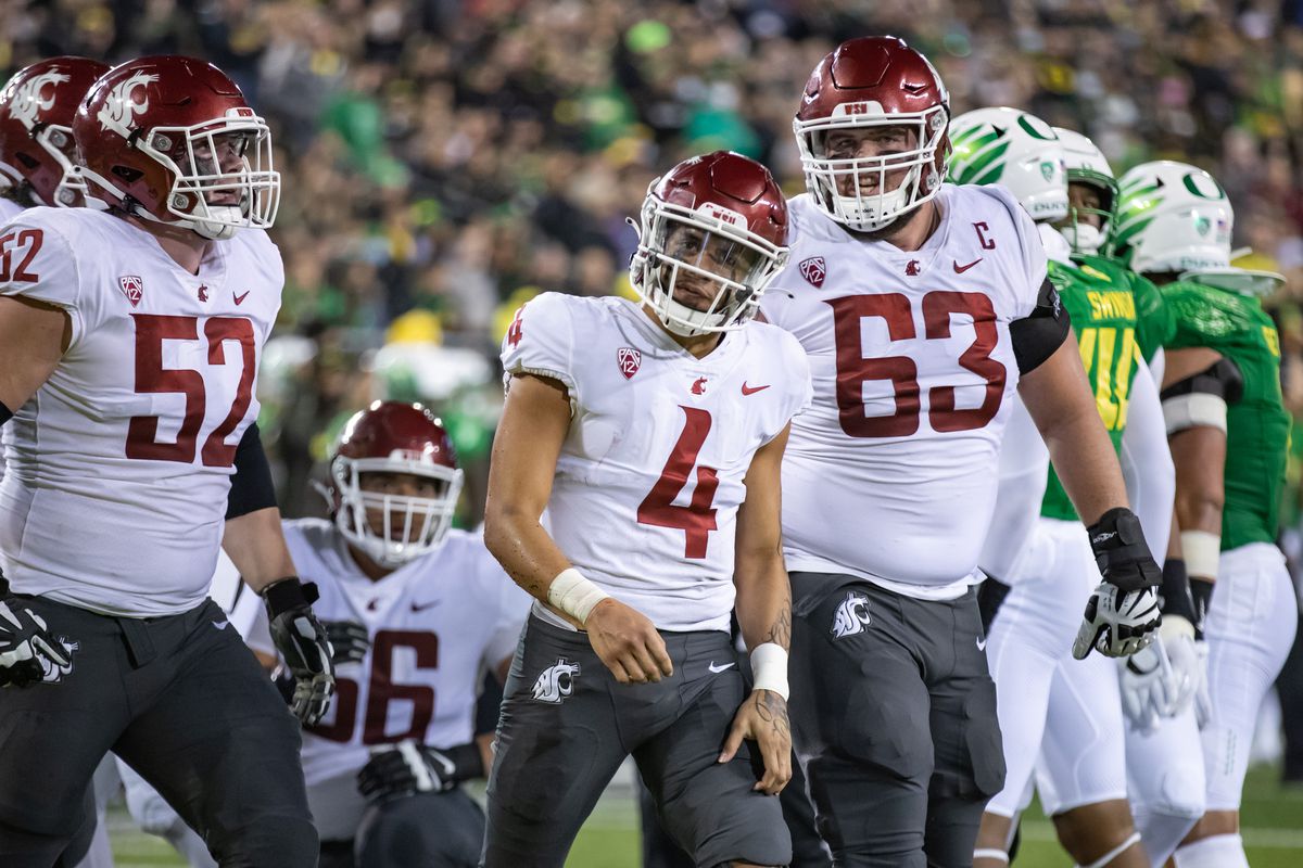 EUGENE, OR - NOVEMBER 13: Washington State quarterback Jayden de Laura (4) celebrates a game-tying touchdown during the first half of a PAC 12 conference matchup between the Oregon Ducks and the Washington State Cougars on November 13, 2021, at Autzen Stadium in Eugene, OR.