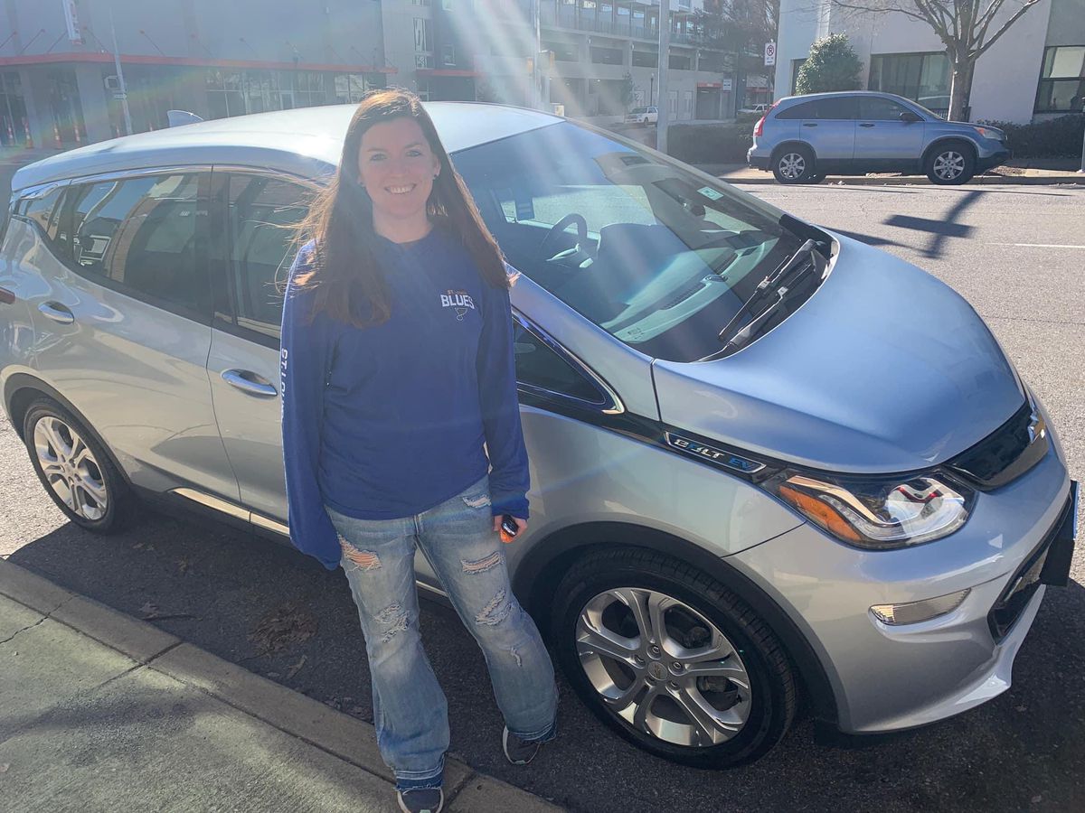 Photo of woman in front of Chevrolet Bolt