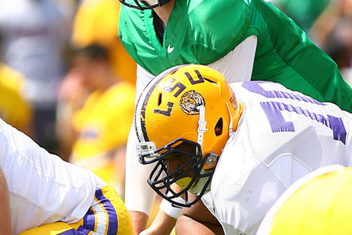Mar 31, 2012; Baton Rouge, LA, USA;  LSU Tigers quarterback Zach Mettenberger (8) waits for the snap during the 2012 spring game at Tiger Stadium.  Mandatory Credit: Spruce Derden-US PRESSWIRE