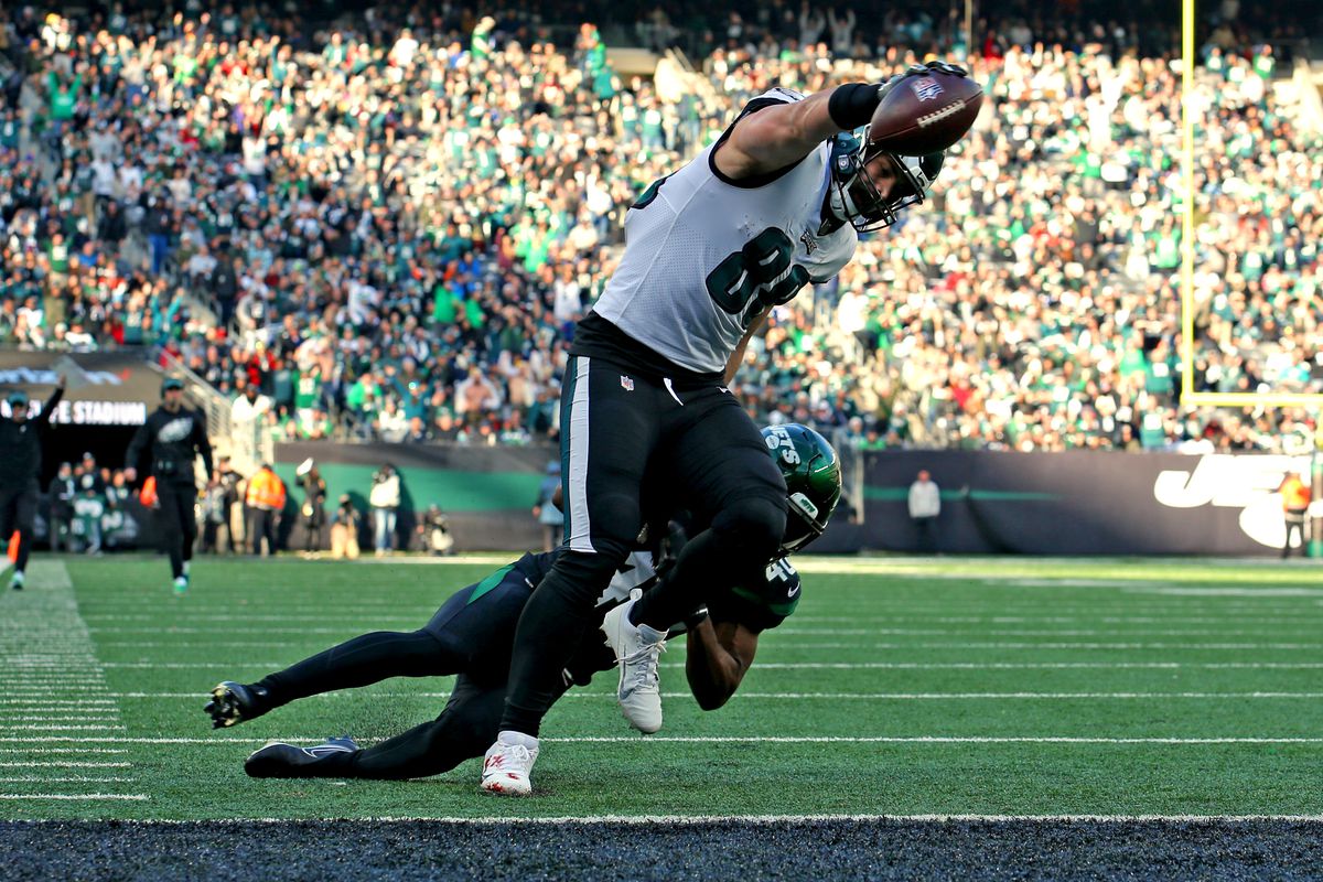 Philadelphia Eagles tight end Dallas Goedert (88) scores a touchdown against New York Jets cornerback Javelin Guidry (40) during the second quarter at MetLife Stadium.
