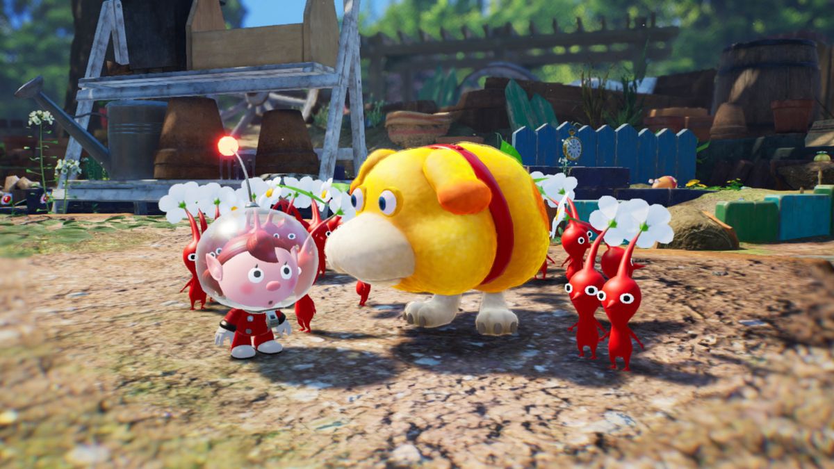 Olimar, his dog companion Oatchi, and a group of red Pikmin in Pikmin 4