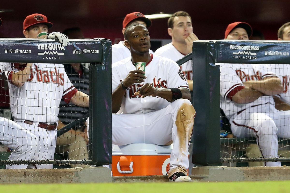 PHOENIX, AZ - SEPTEMBER 20:  Justin Upton #10 of the Arizona Diamondbacks watches from the dugout during the MLB game against the San Diego Padres at Chase Field on September 20, 2012 in Phoenix, Arizona.  (Photo by Christian Petersen/Getty Images)