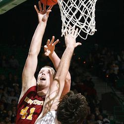 Iowa State's Justin Hamilton (41) scores over Baylor defender Josh Lomers (50) in the first half.