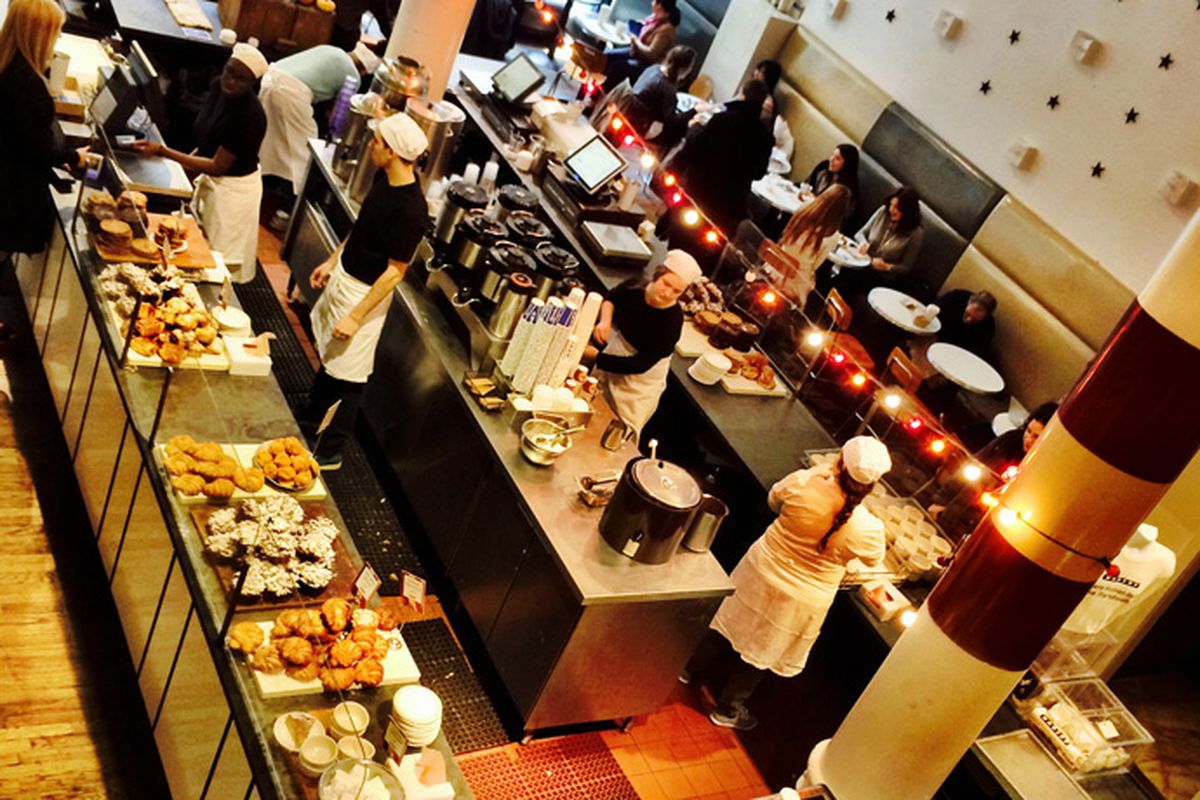 An overhead shot of a U-shaped counter at a bakery