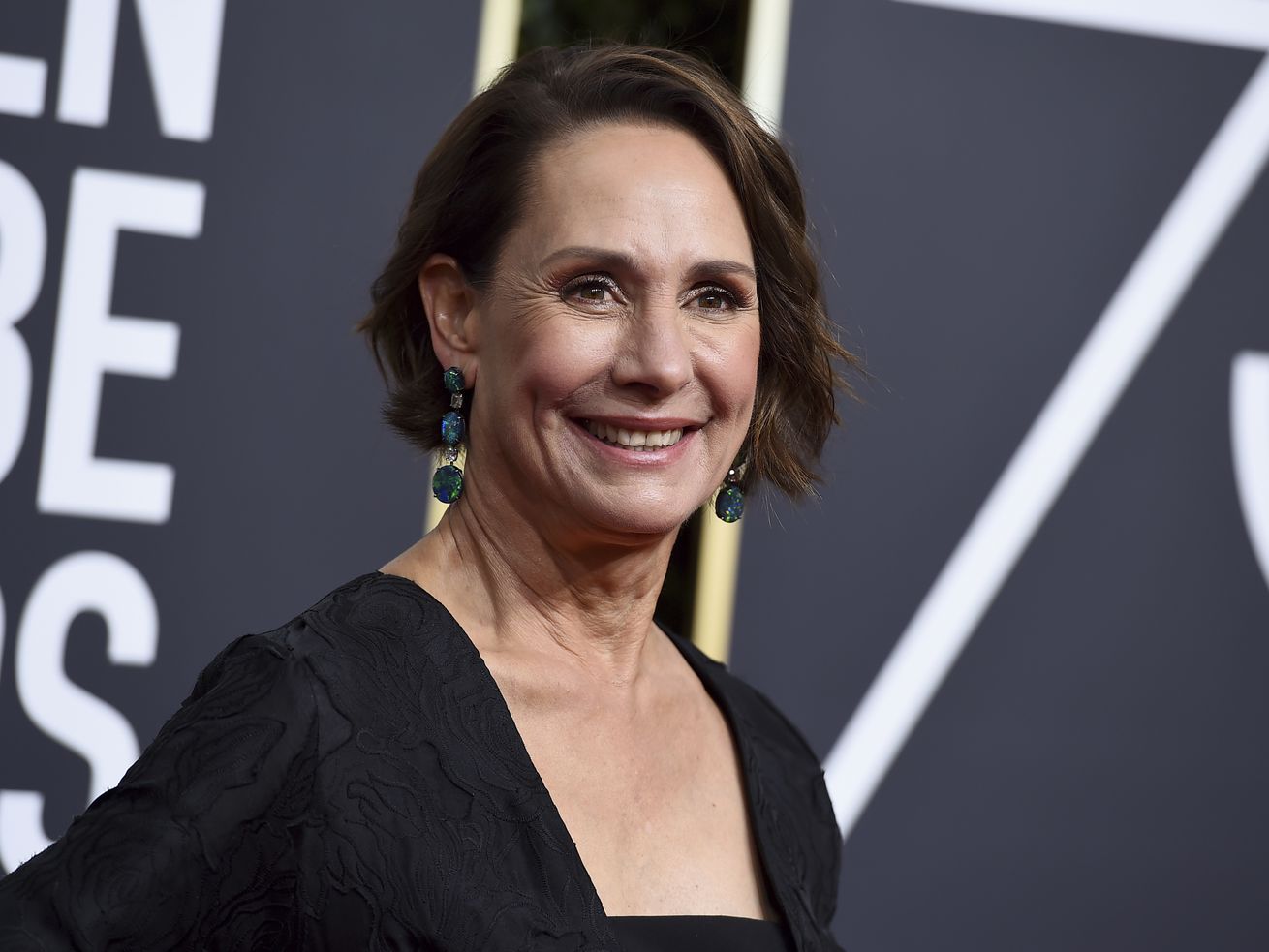 Actress Laurie Metcalf arrives at the 75th annual Golden Globe Awards in Beverly Hills, California, in 2018.