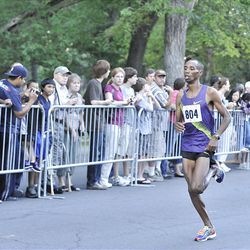 Aron Rono runs the Deseret News 10K race that started in Research Park and ended in Liberty Park in Salt Lake City Saturday.