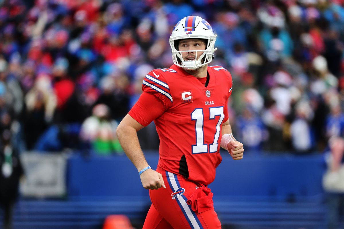 Bills quarterback Josh Allen comes off the field after one of his three touchdown passes. The Bills beat the Panthers 31-14